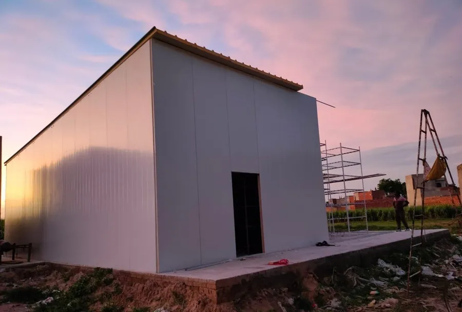 A single-room MushroomWale build at dusk