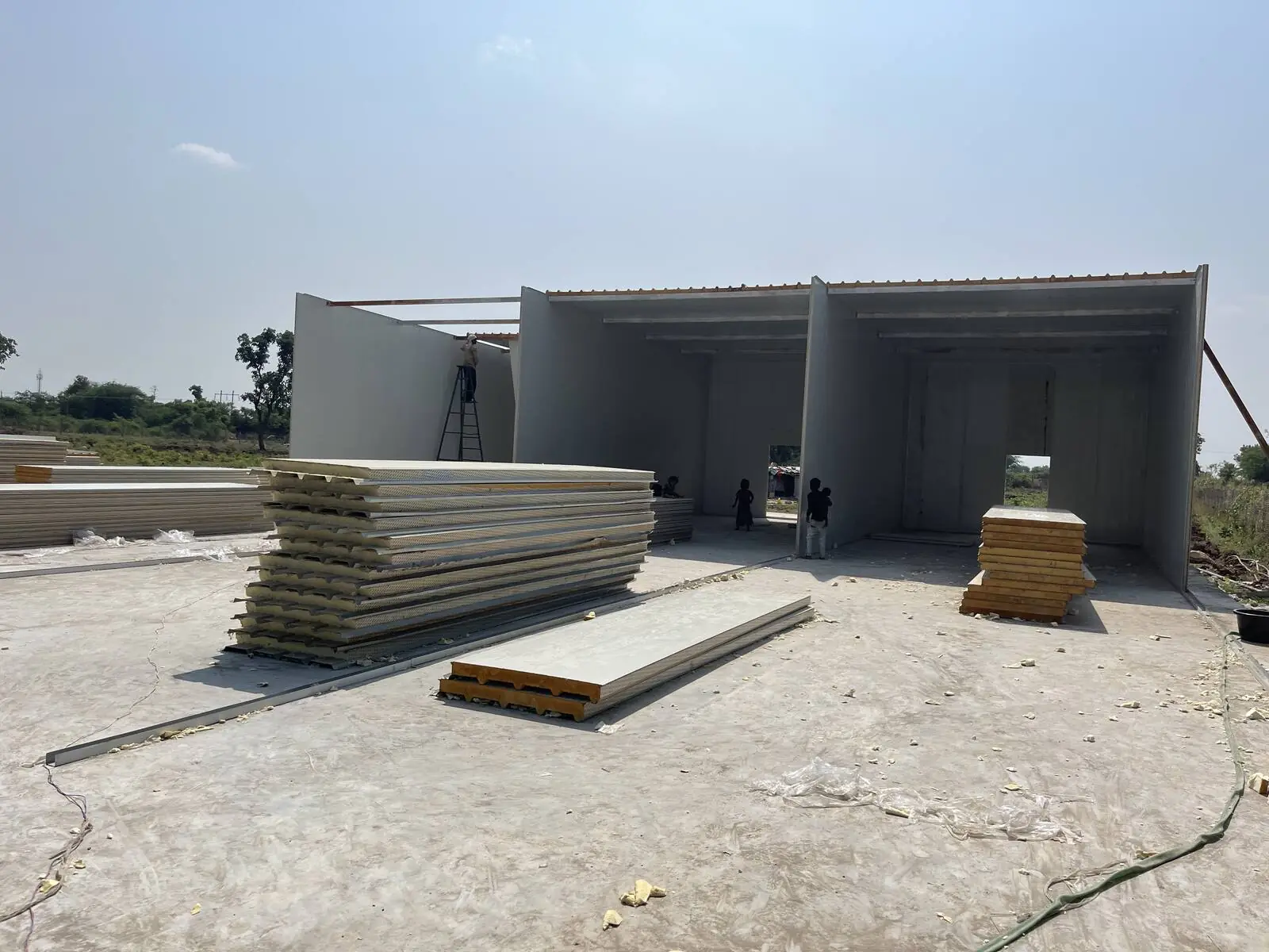 PUF panels being erected on the plinth