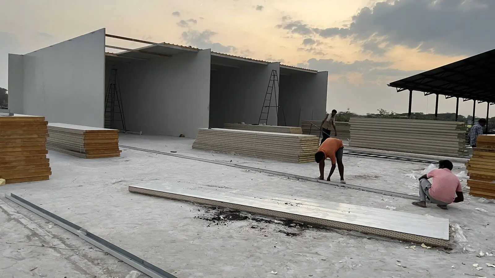 A MushroomWale grow-room block going up, with panels on the ground